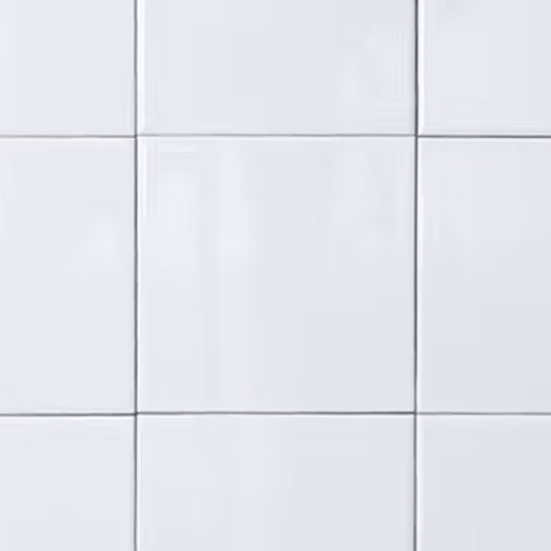 Fyrkantigt, vitt blankt kakel med grå fog